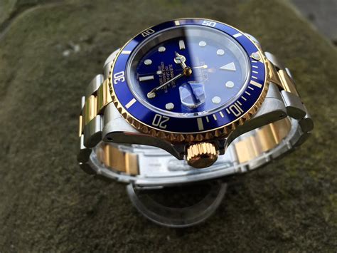 rolex gold blue dial submariner